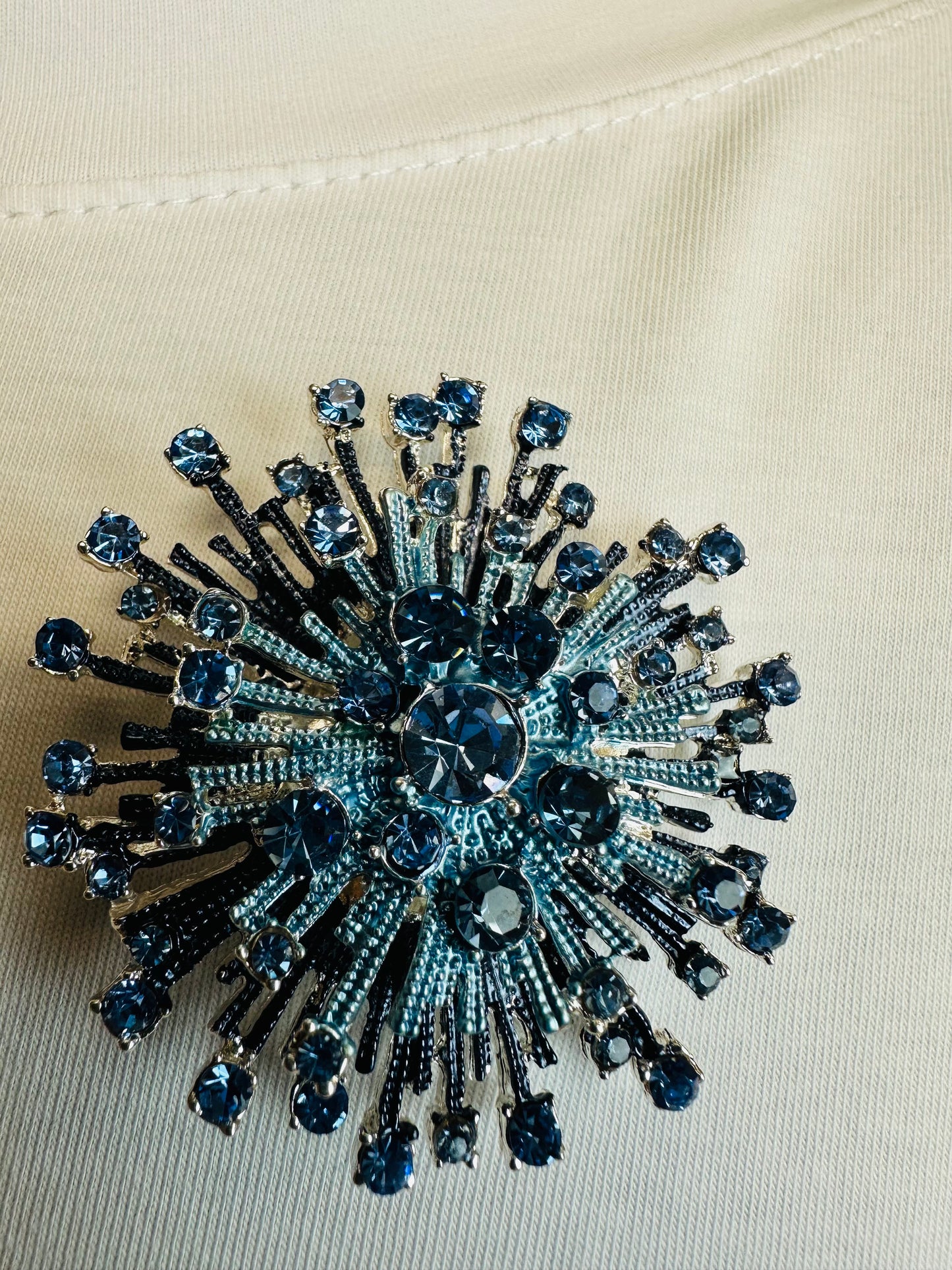 Sky blue starburst magnetic brooch collection