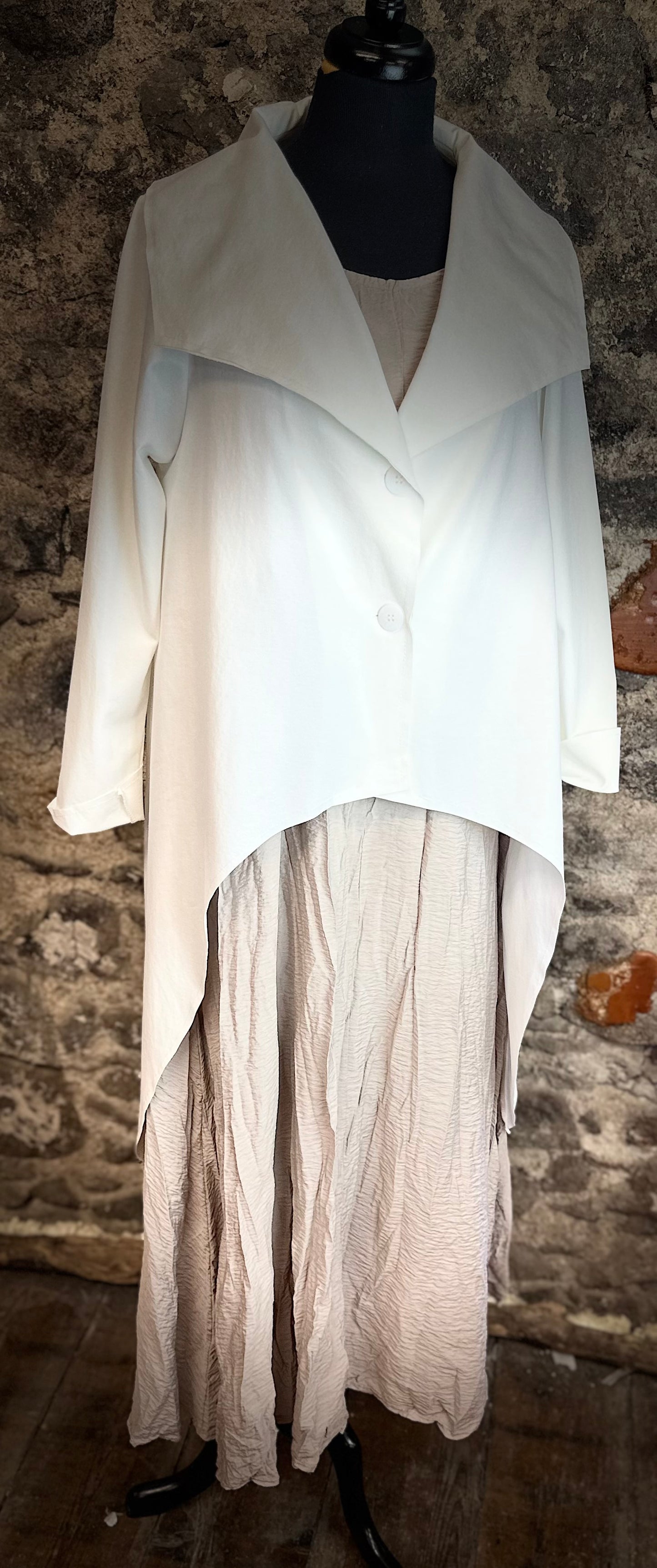 “Mira “ Italian unusual dipped hem jacket cream