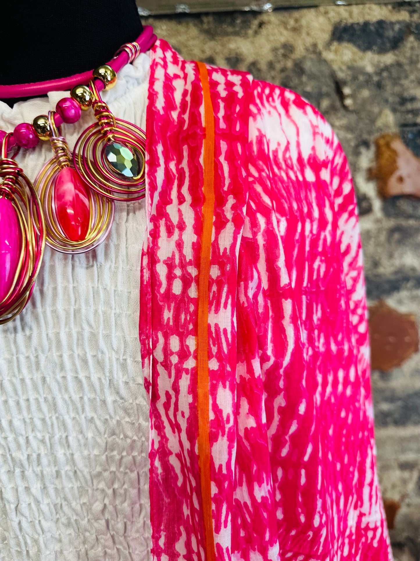 Cerise and tangerine border statement wrap