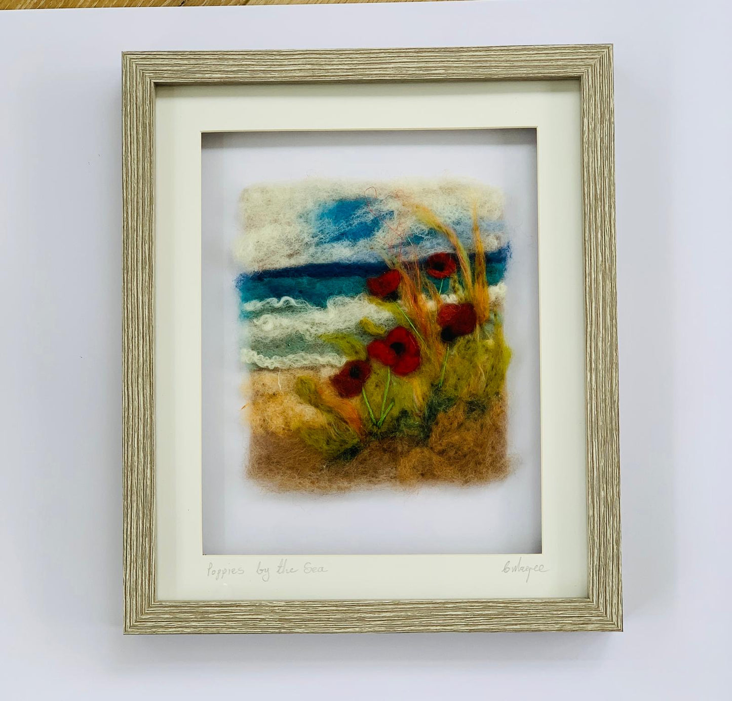 “Poppies by the sea “