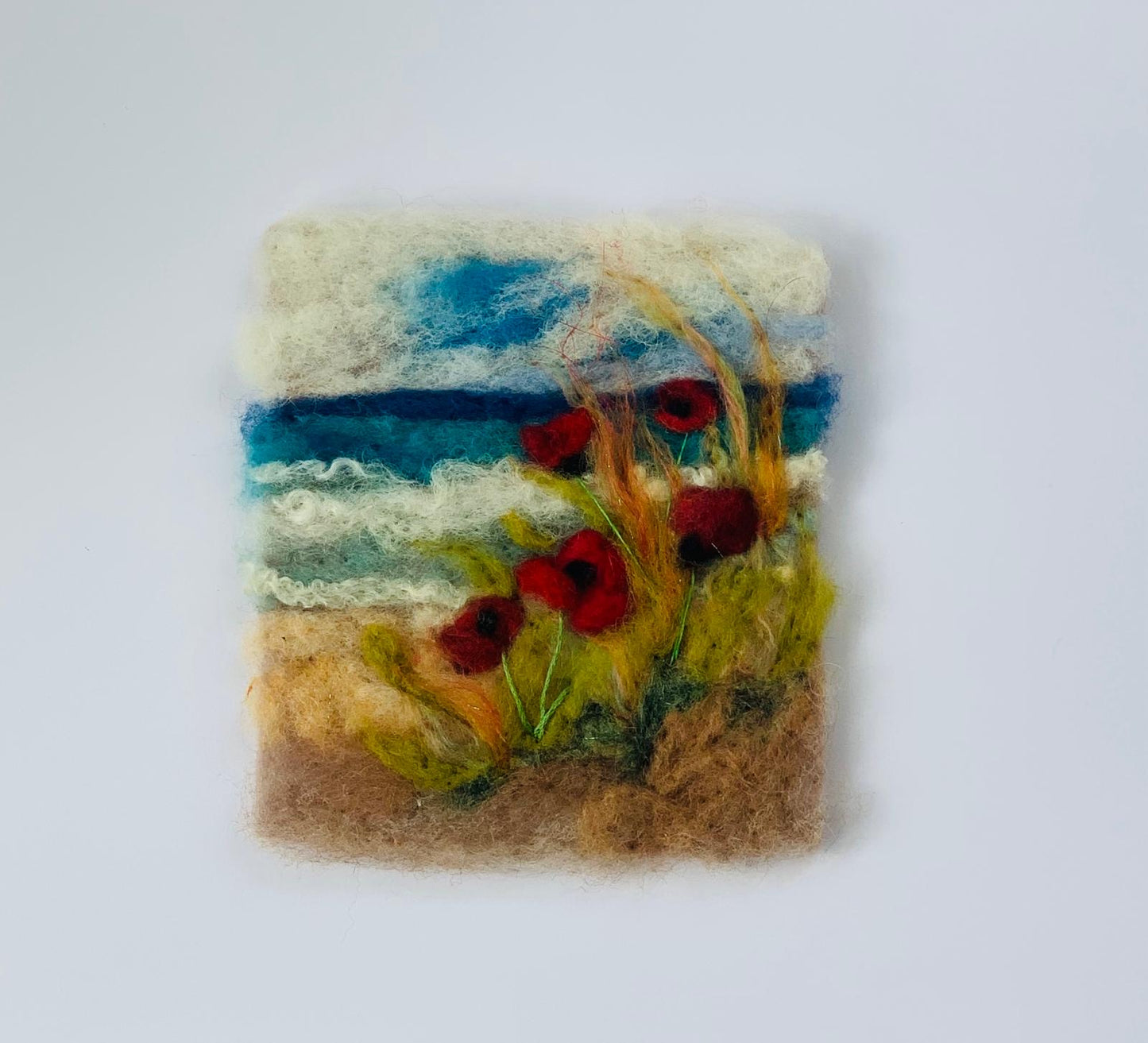 “Poppies by the sea “