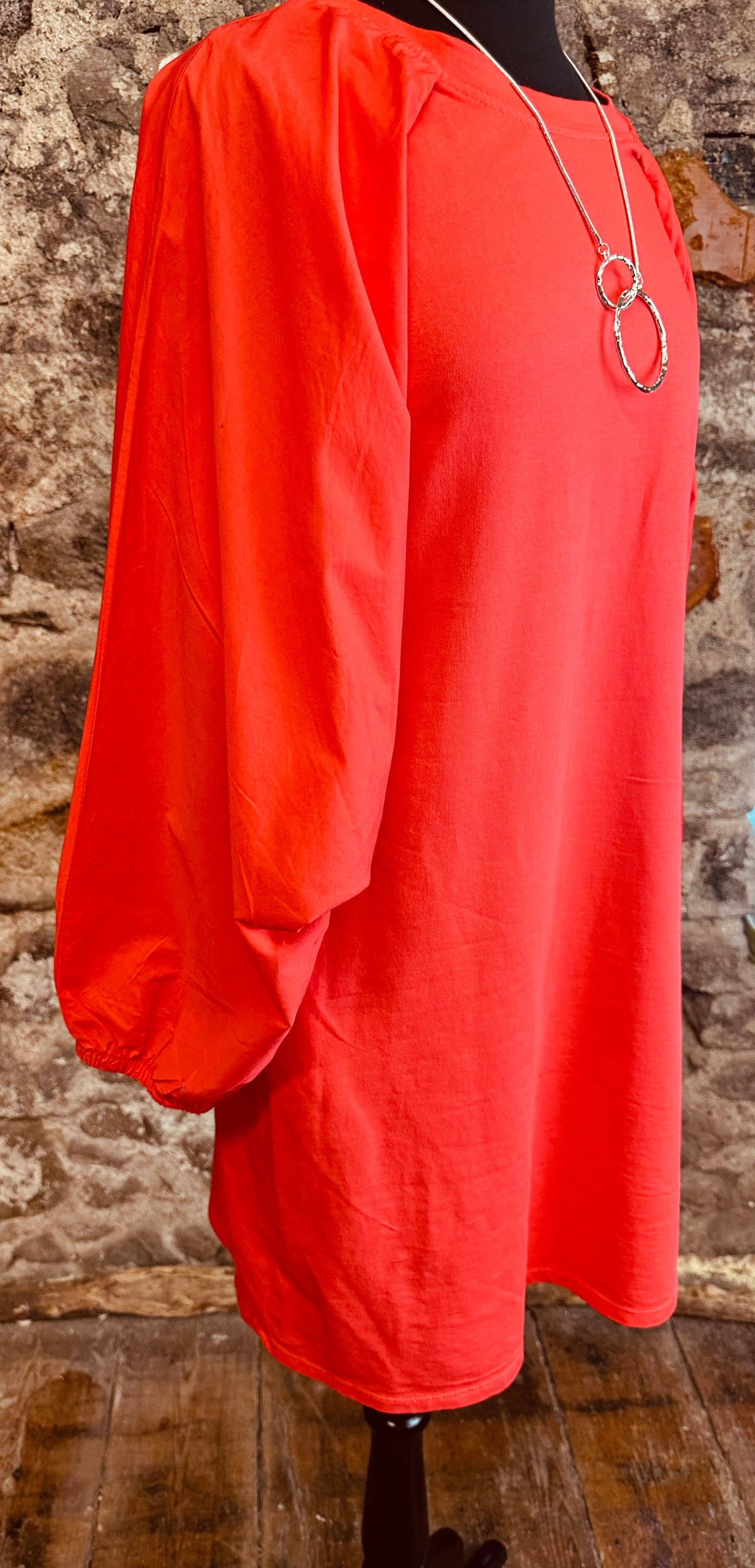“Nancy “ contemporary coral Italian jersey and cotton caped dress