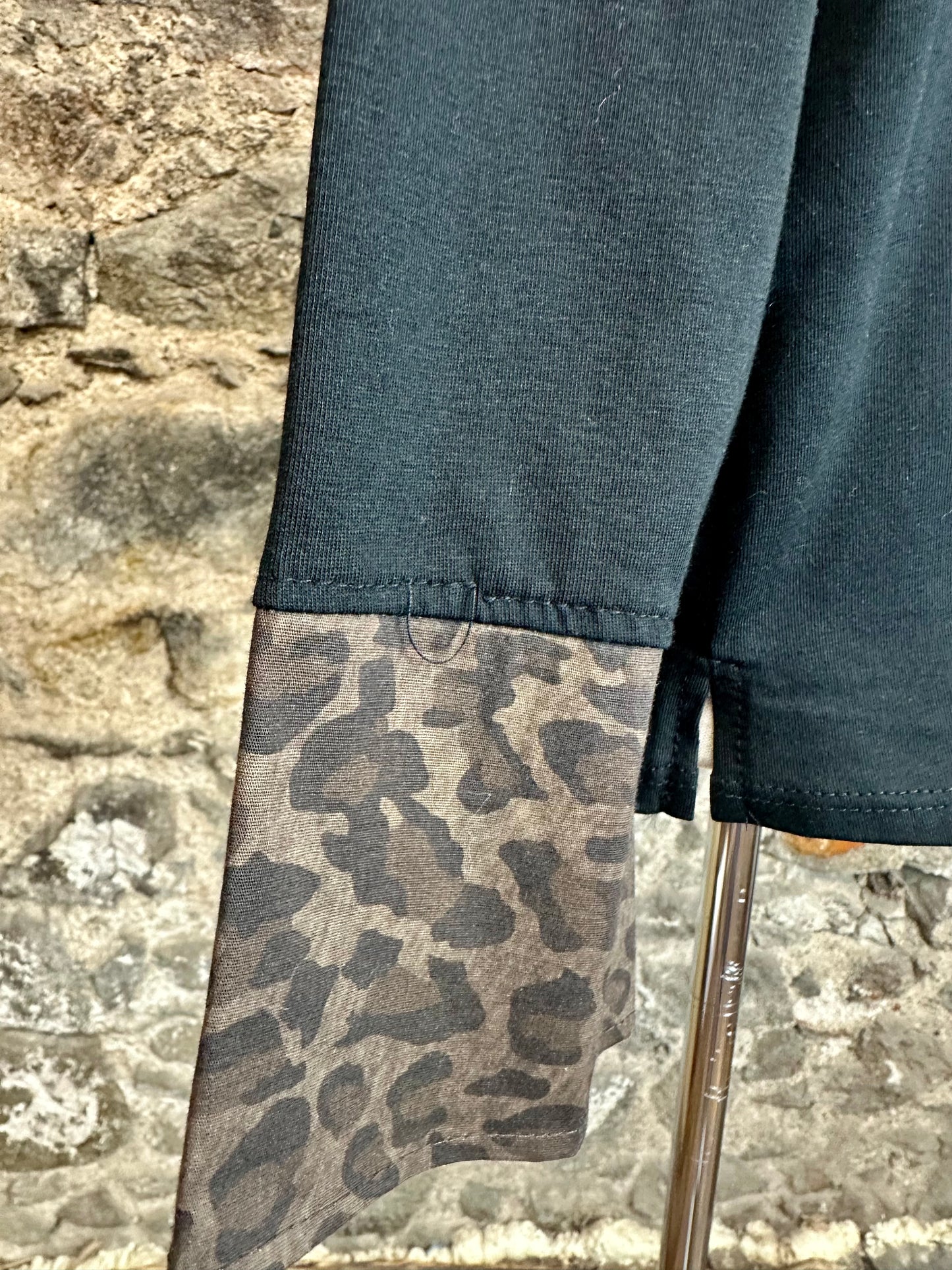 “Lou Lou “ jet black collared animal print Italian shirt