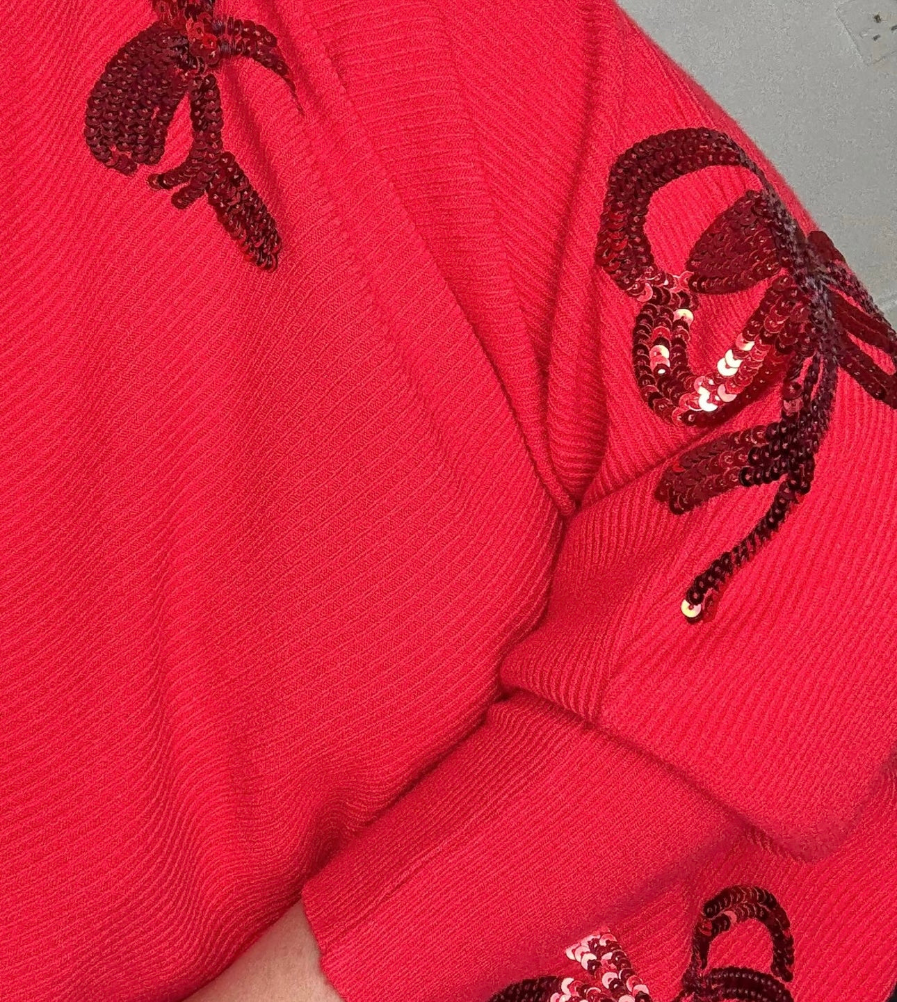 “Jez “ sequin  bow Italian knit