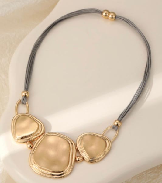 Gold and grey leather contemporary statement neckpiece
