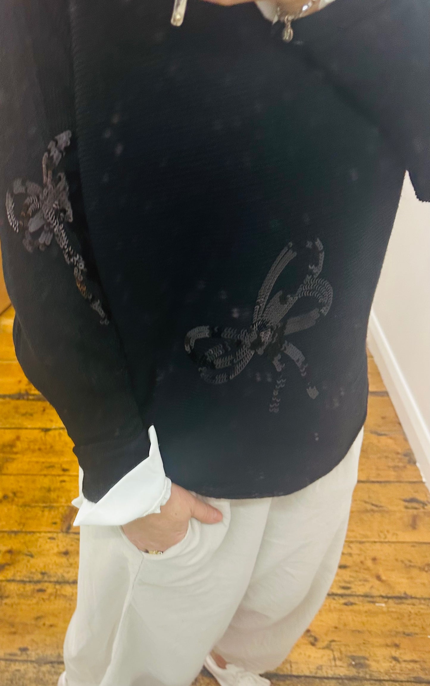 “Jez “ Ebony black sequin bow Italian knit