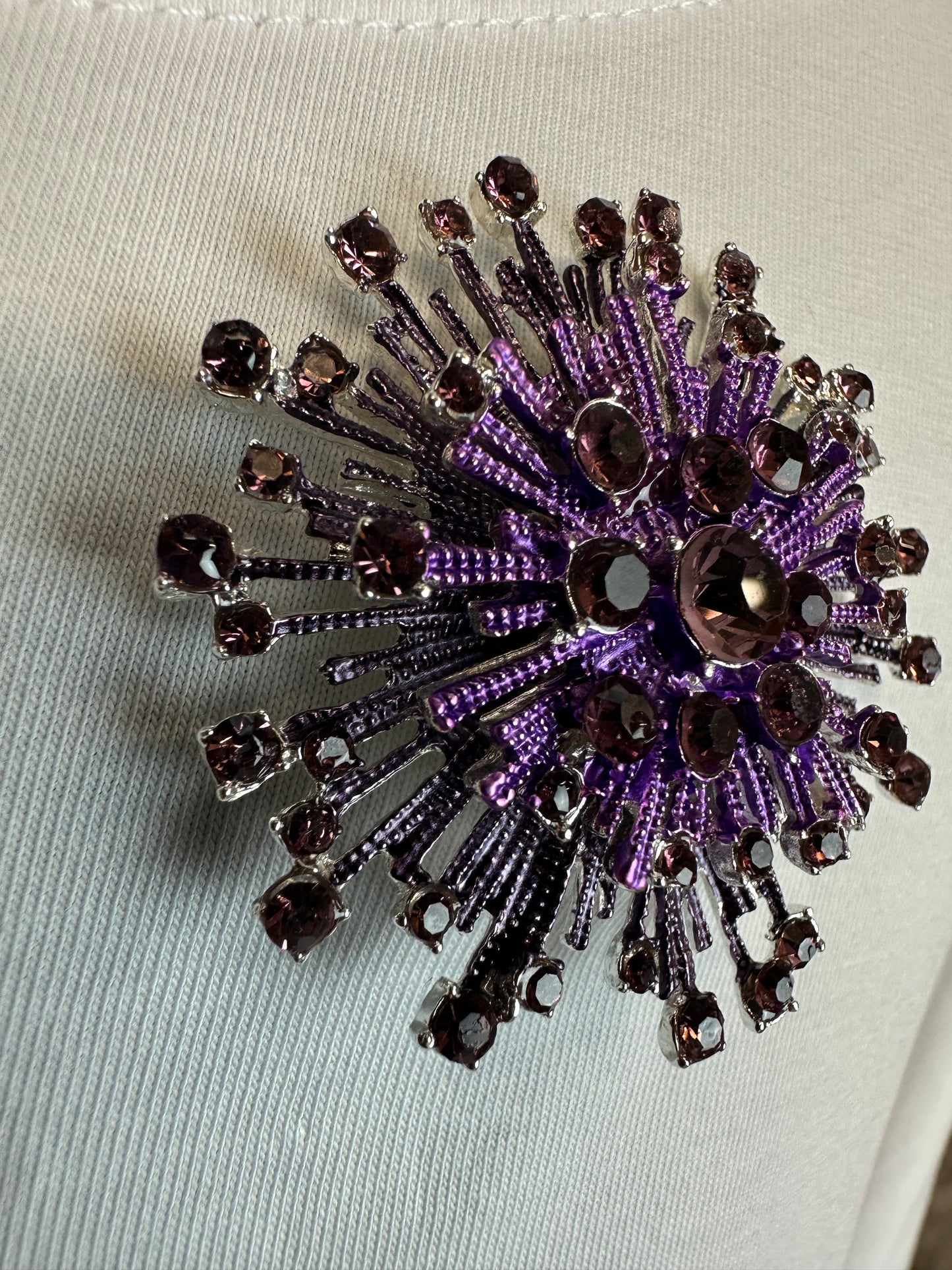 Magenta starburst magnetic brooch collection