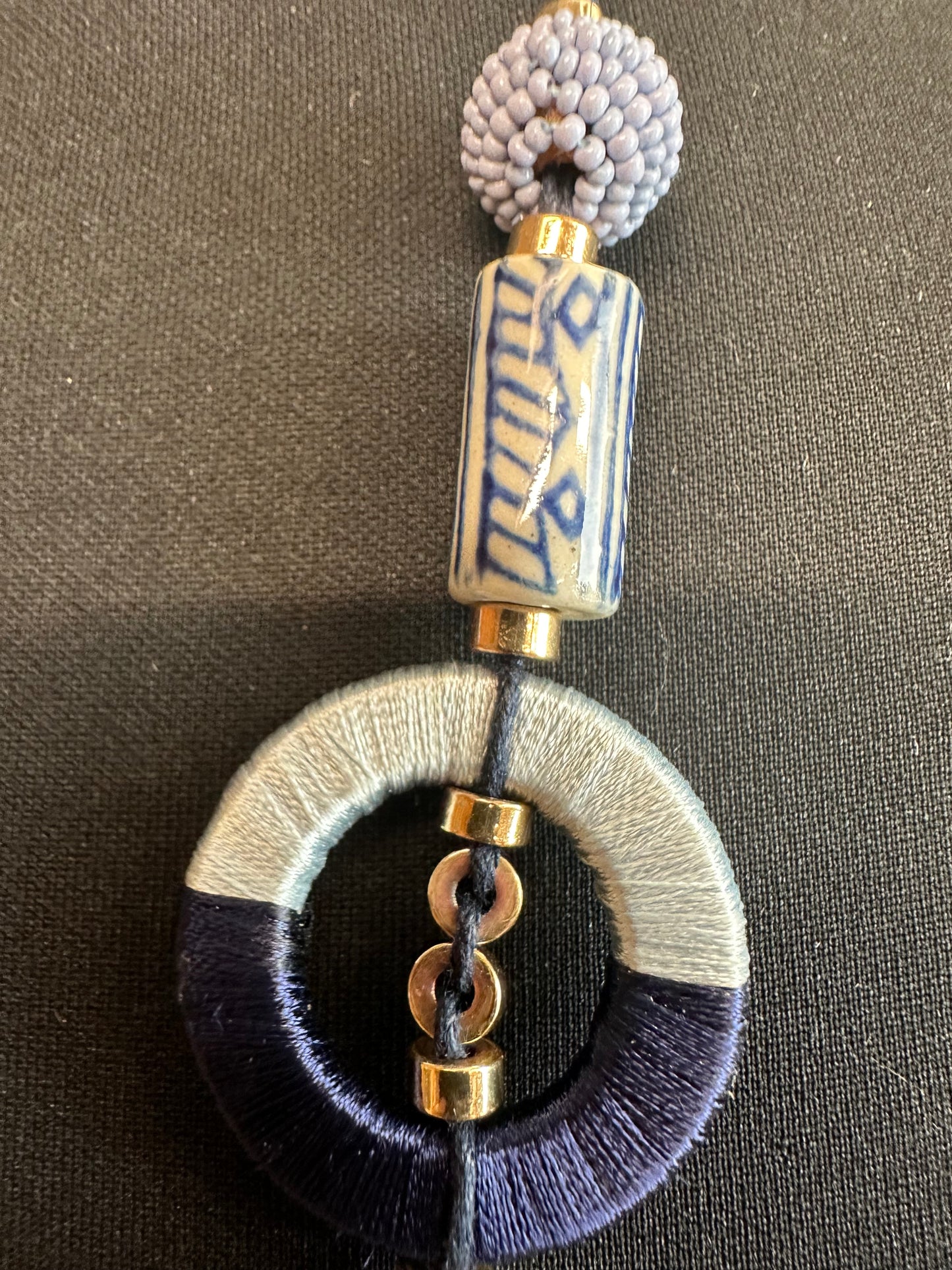 Navy thread wrapped and porcelain bead neckpiece