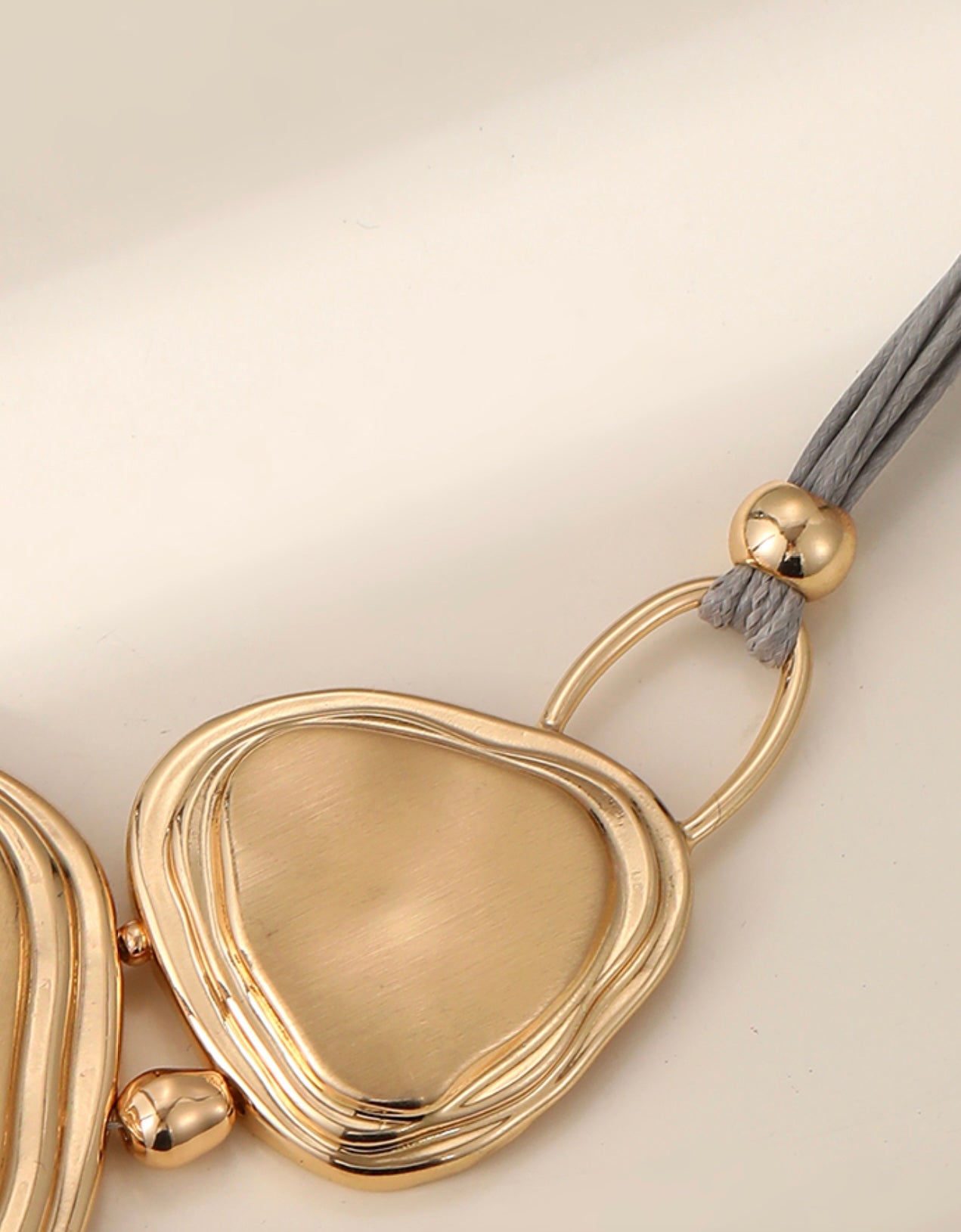 Gold and grey leather contemporary statement neckpiece