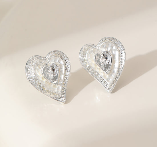 Beautiful subtly silver plated heart earrings