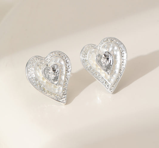 Beautiful subtly silver plated heart earrings
