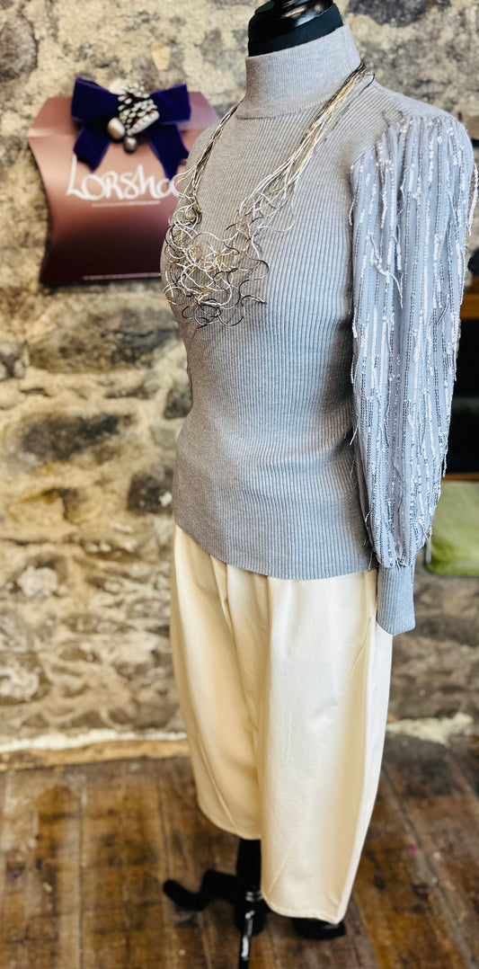 “Georgina “ dove grey dramatic sparkling knit sleeve