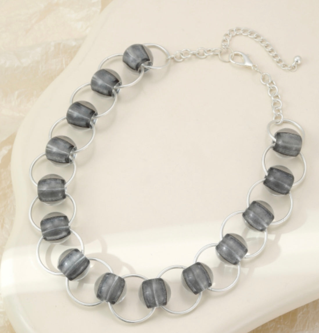 Short interlinked silver and grey resin bead statement neckpiece