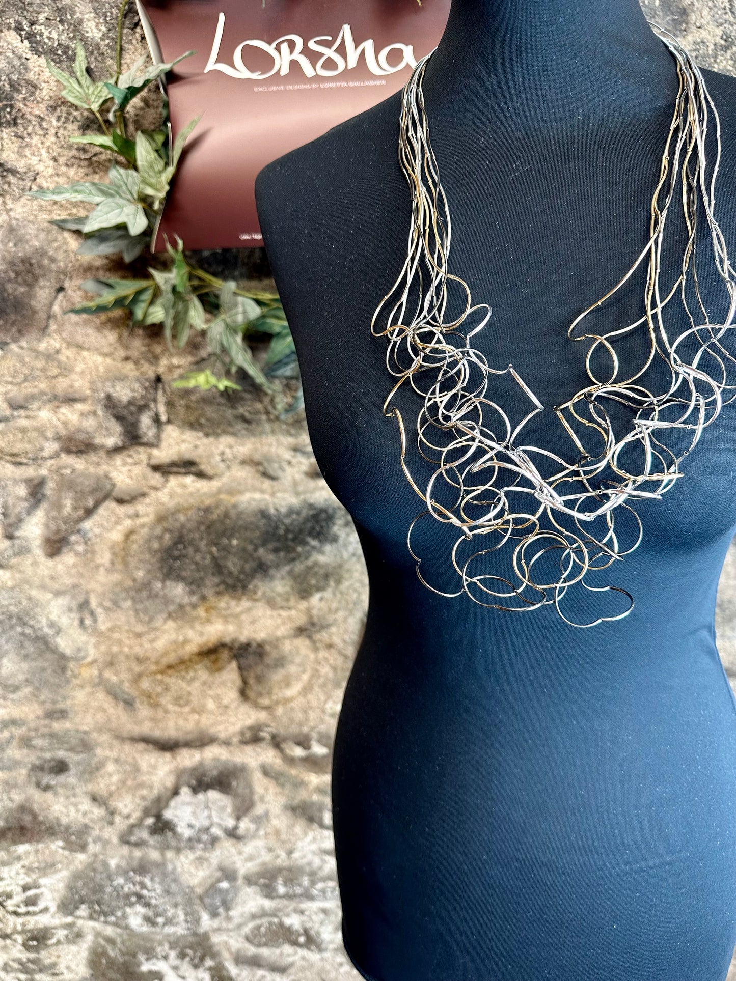 Lorsha 3 colour link statement curly neckpiece..silver graphite..gold long