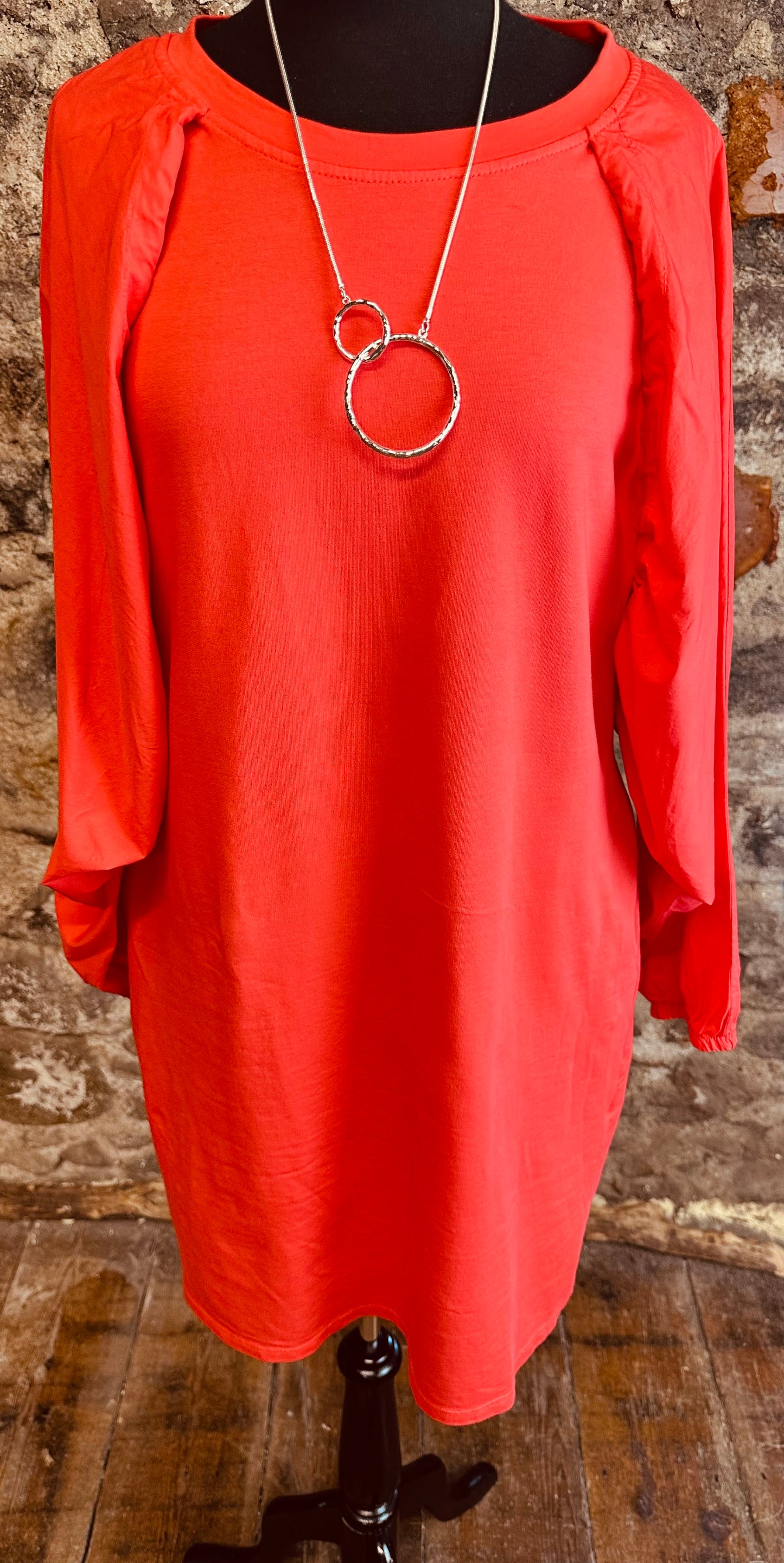 “Nancy “ contemporary coral Italian jersey and cotton caped dress
