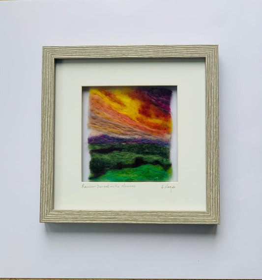 “Rainbow sunset in the mournes “by Christine Magee