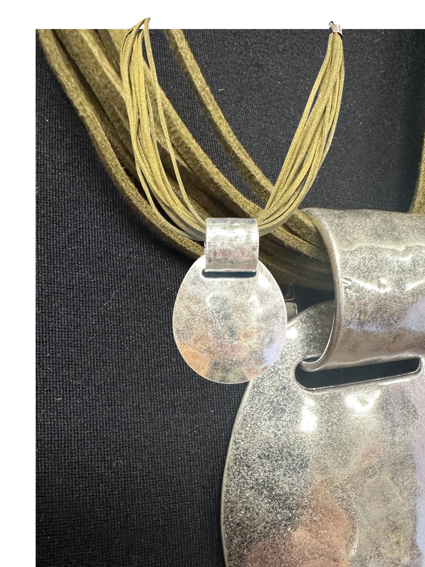 Statement brushed silver metal neckpiece with soft suede olive green collar