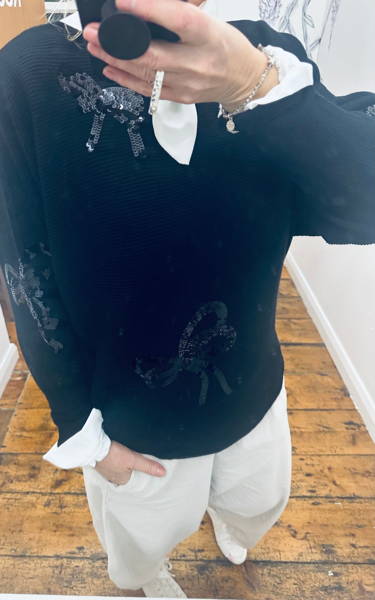 “Jez “ Ebony black sequin bow Italian knit
