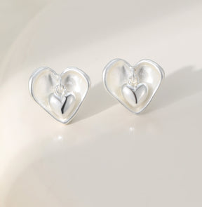 Silver heart within silver heart giftboxed stud earrings