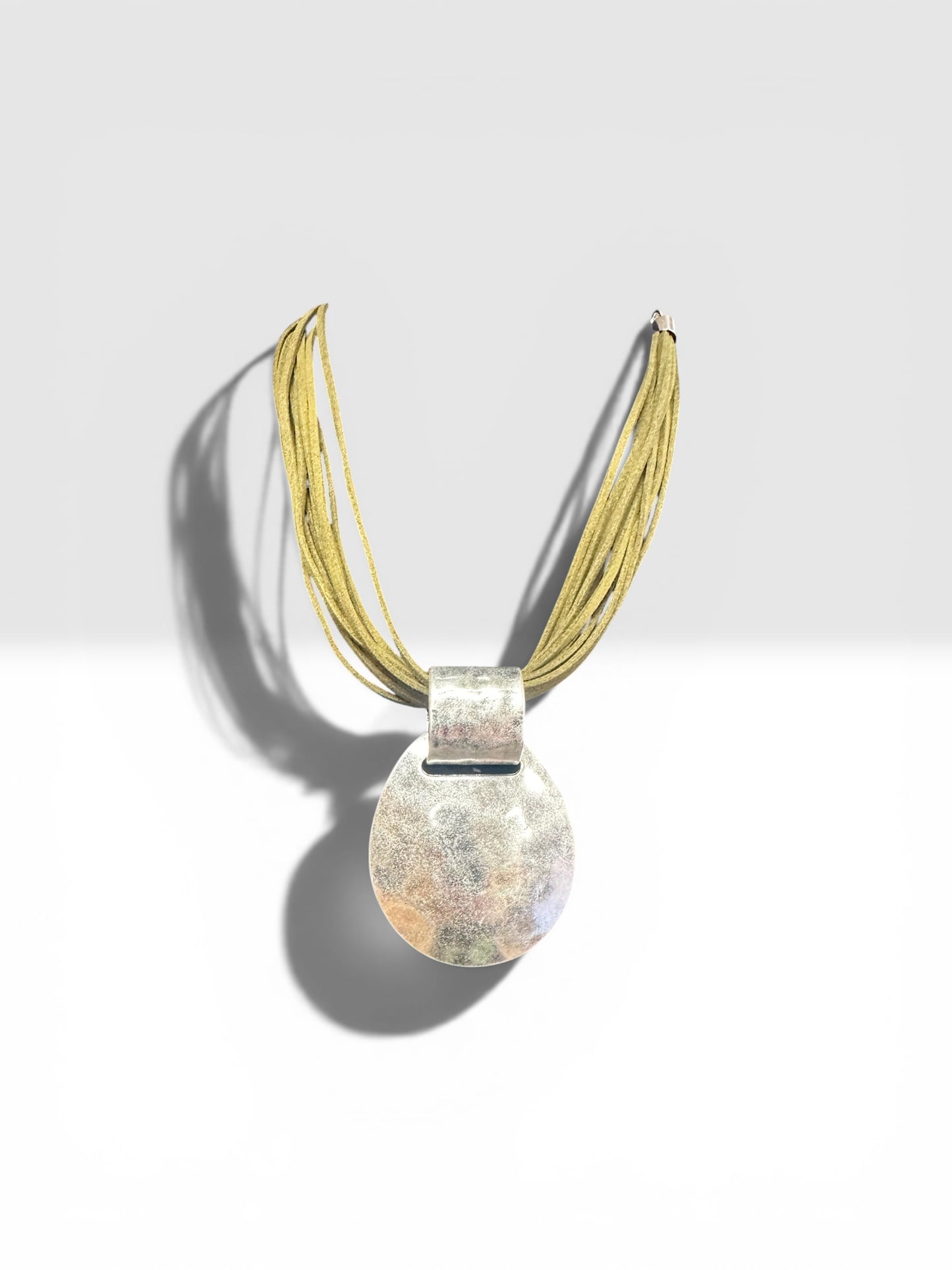 Statement brushed silver metal neckpiece with soft suede olive green collar