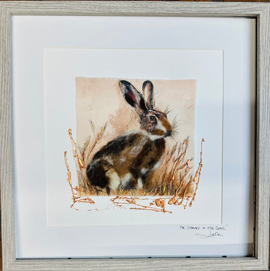 “The dreamer in the grass “the land speaks softly to the one who listens