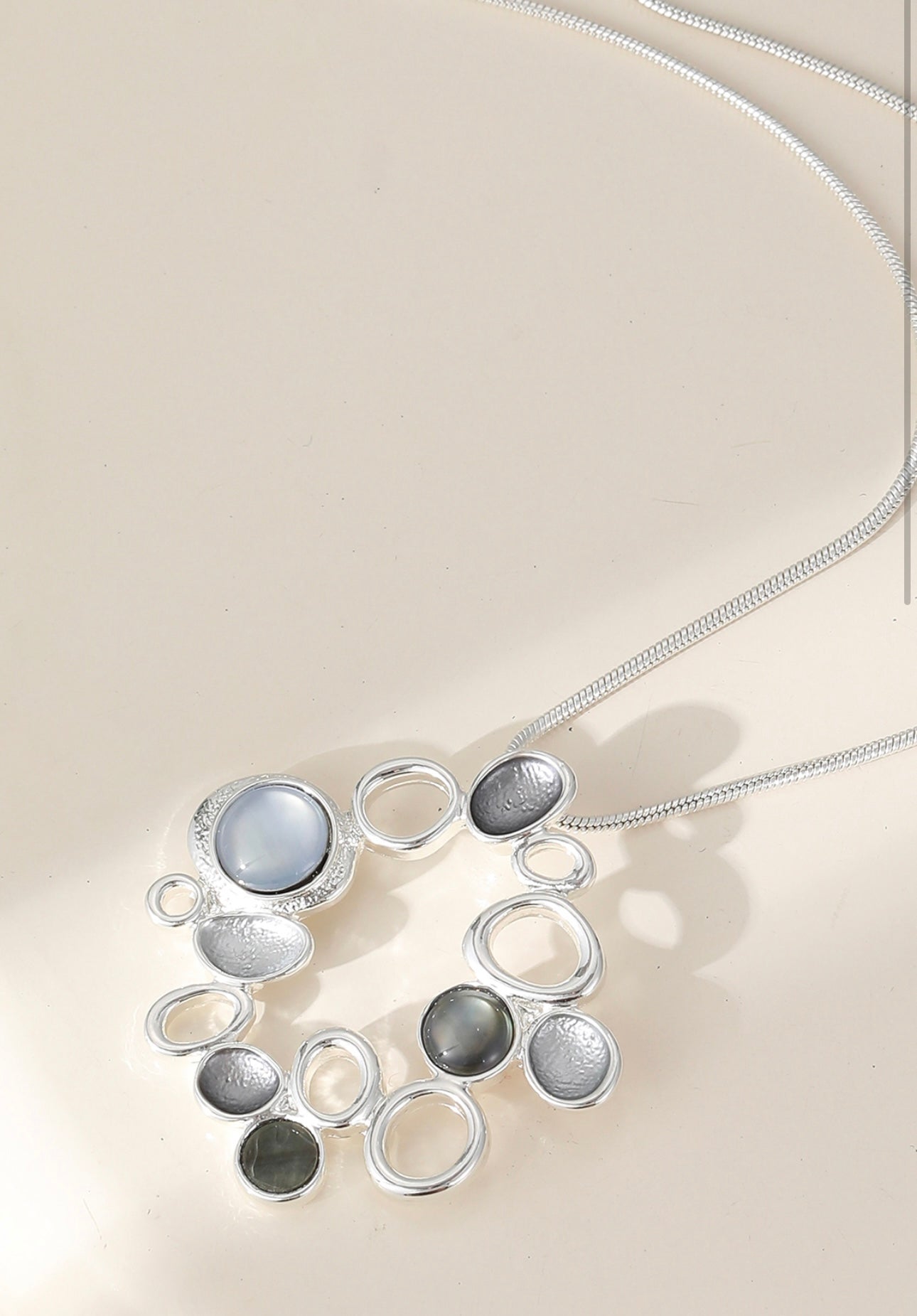 Beautiful delicate circle pebble neckpiece