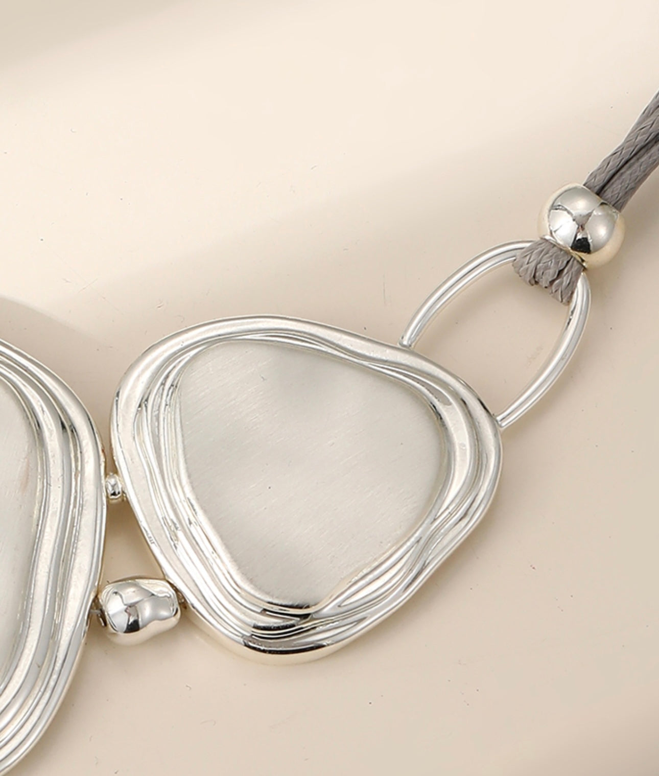 Silver plated short contemporary neckpiece