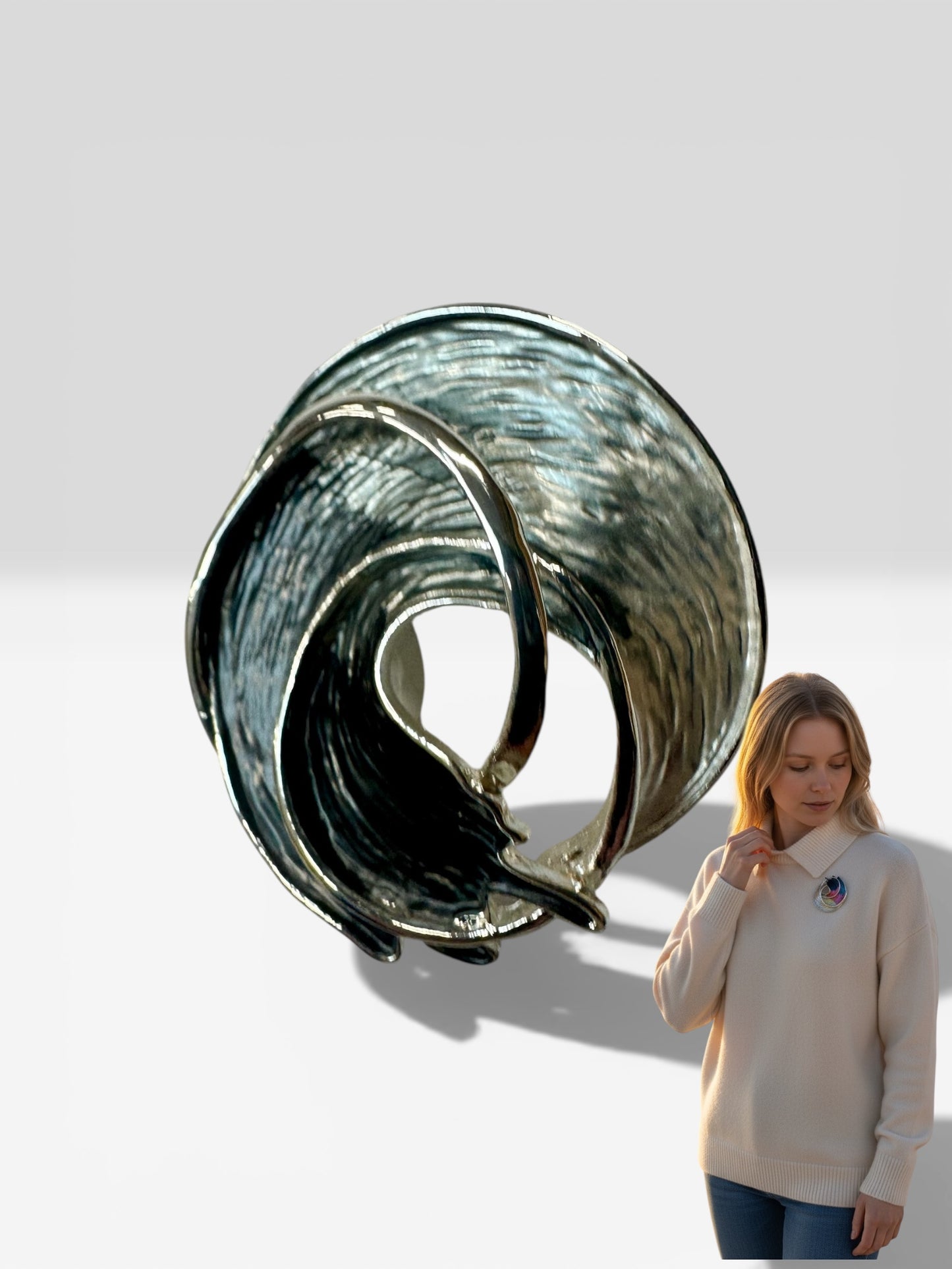 Monochrome ebony and silver Celtic wave magnetic brooch