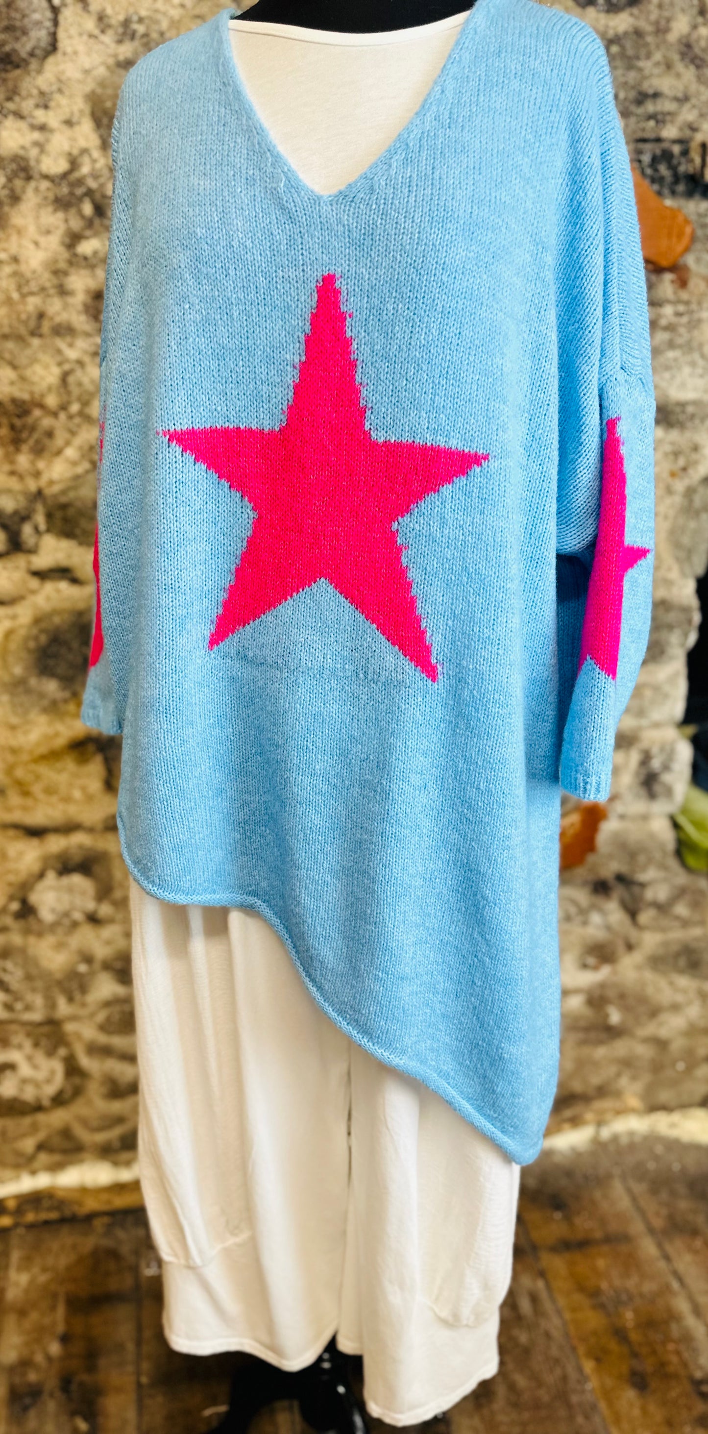 “Preya “ sky blue Italian cosey asymmetric knit