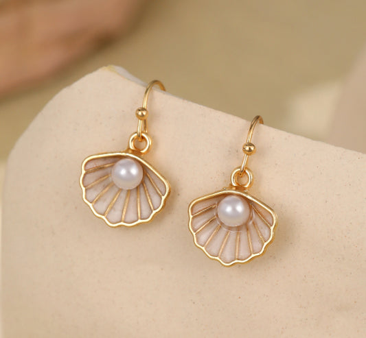 Delicate shell gold plated earrings with pearl inset