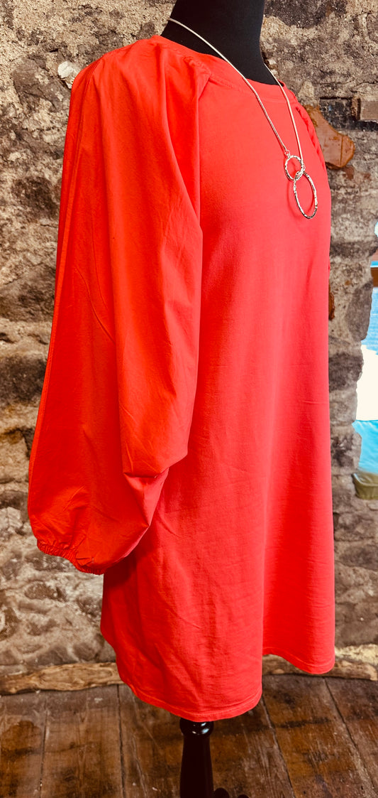 “Nancy “ contemporary coral Italian jersey and cotton caped dress