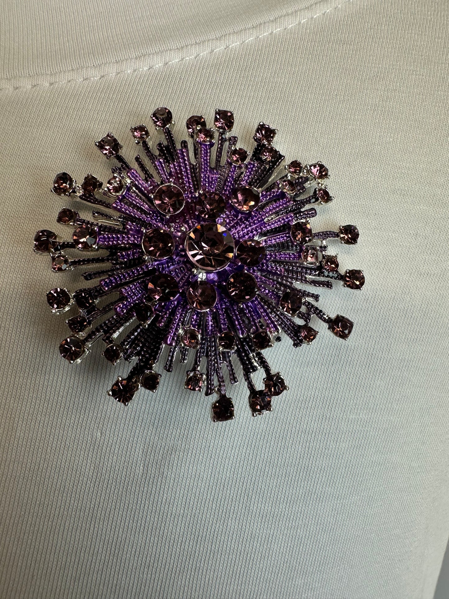Magenta starburst magnetic brooch collection