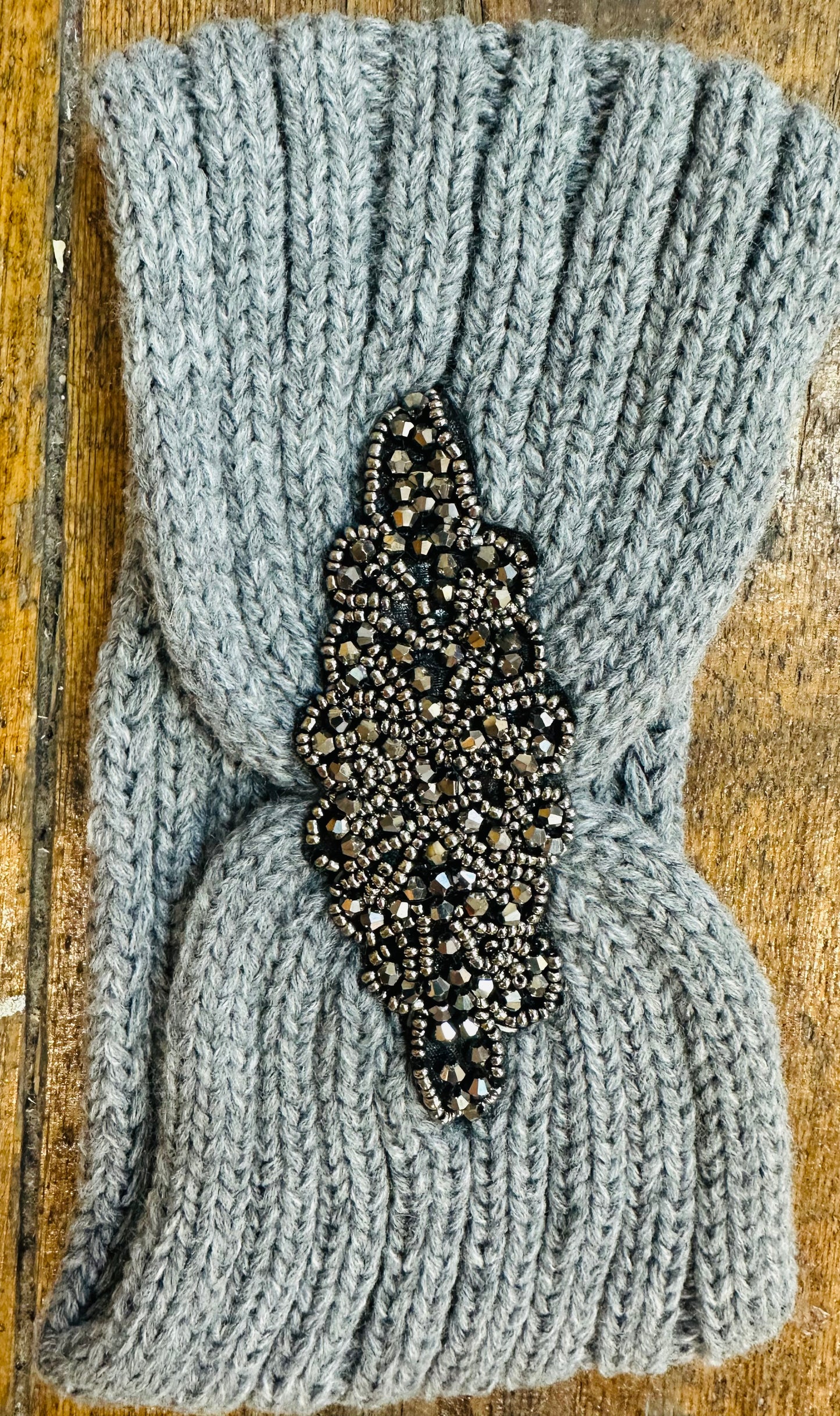 Grey embellished cable head band