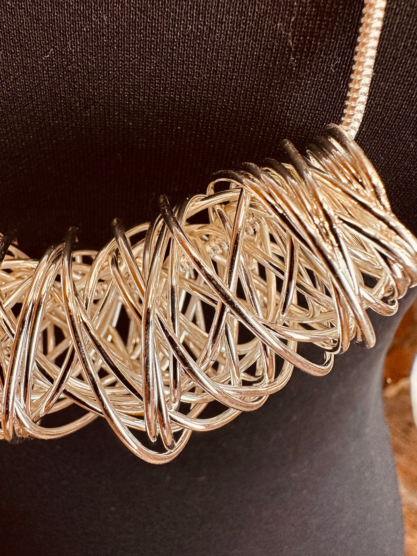 Sculpted sophistication statement wire twist necklace