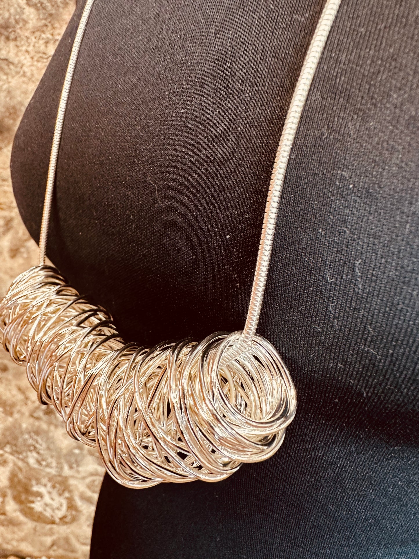 Sculpted sophistication statement wire twist necklace